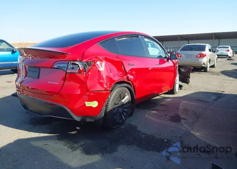 2022 Tesla Model Y Long Range Dual Motor All-Wheel Drive from USA, damaged, VIN 7SAYGDEE9NF407840